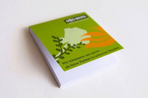 softcover-haftnotizbuch-grün-mit-logo-juerg-siegrist-ag