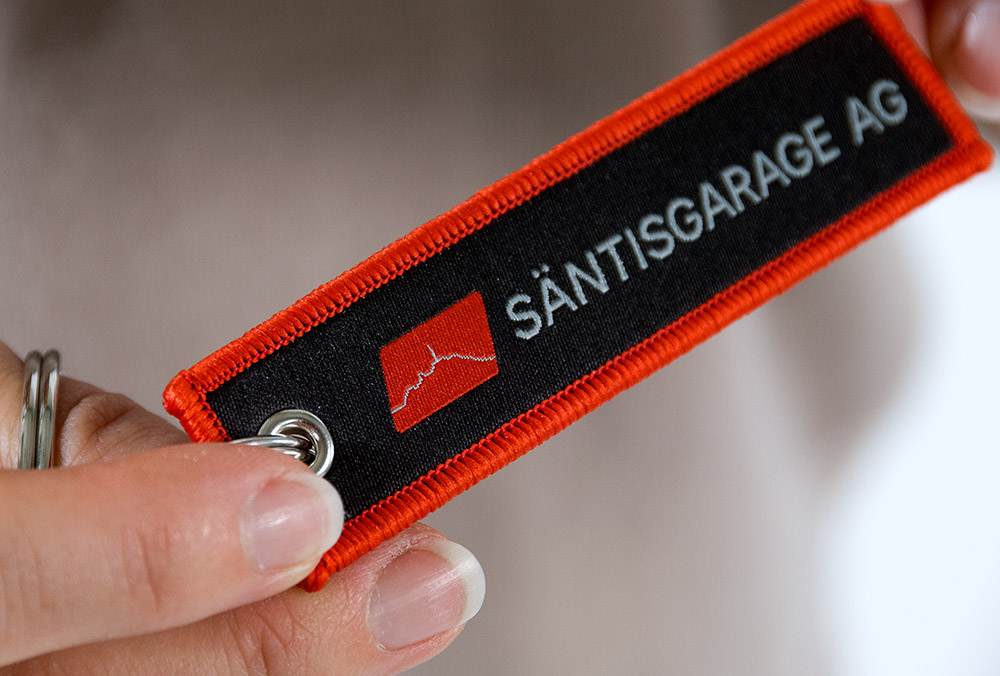 Säntisgarage-Schlüsselband mit Logo fein eingewoben, Juerg Siegrist AG