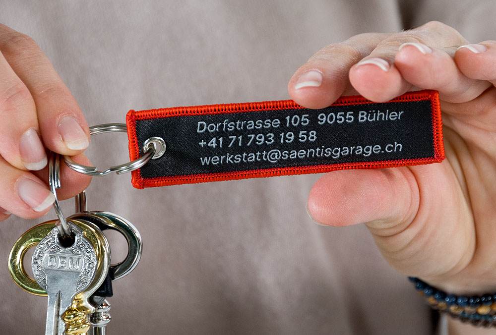 Säntisgarage-Schlüsselband mit Logo fein eingewoben, Juerg Siegrist AG