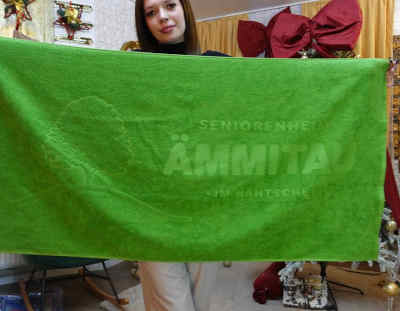 Badefrottiertuch mit Jacquard-gewoben Ton in Ton Ämmital-Logo – Juerg Siegrist AG Werbeartikel