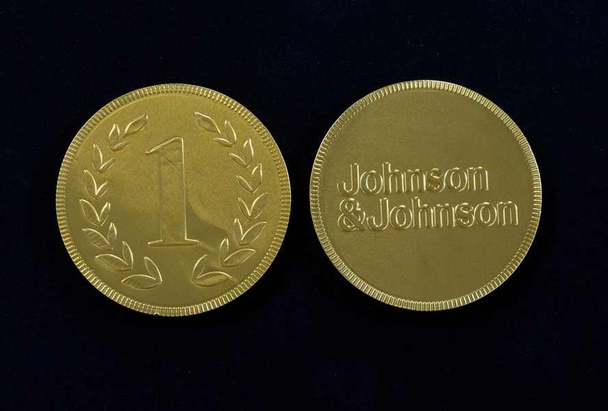 Schokoladentaler und -münzen geprägt für Johnson&Johnson – Juerg Siegrist AG Werbeartikel